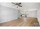 Open living room with hardwood floors and kitchen access at 17 N Arlington St, Salisbury, NC 28144