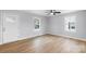 Living room featuring wood-look floors and neutral walls at 17 N Arlington St, Salisbury, NC 28144
