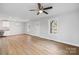 Spacious living area with hardwood floors and kitchen view at 17 N Arlington St, Salisbury, NC 28144