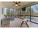 Screened porch with seating area overlooking the pool at 241 Spring Run Dr, Mooresville, NC 28117