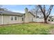 Exterior view of home with green grass and trees at 2712 New Hamlin Way, Charlotte, NC 28210