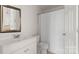Bathroom vanity with mirror, toilet, and shower with curtain at 2712 New Hamlin Way, Charlotte, NC 28210