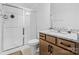 Clean bathroom featuring a glass-enclosed shower, granite countertop, and modern fixtures at 401 Portrait Way, Indian Trail, NC 28079