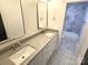 Bathroom with double vanity, updated fixtures and bathtub at 496 19Th Avenue Nw Cir, Hickory, NC 28601