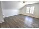 Bedroom with wood floors, window, and ceiling fan at 496 19Th Avenue Nw Cir, Hickory, NC 28601