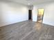 Bright bedroom featuring hardwood floors and en-suite bathroom access at 496 19Th Avenue Nw Cir, Hickory, NC 28601
