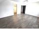Spacious bedroom featuring wood floors and ample closet space at 496 19Th Avenue Nw Cir, Hickory, NC 28601
