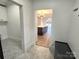 Bright entryway with a view into the kitchen and laundry room at 496 19Th Avenue Nw Cir, Hickory, NC 28601