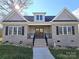 Brick home with double front doors and a landscaped front yard at 496 19Th Avenue Nw Cir, Hickory, NC 28601