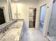 Double vanity bathroom with marble countertops and walk-in shower at 496 19Th Avenue Nw Cir, Hickory, NC 28601