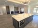 Modern kitchen island with quartz countertop and built-in oven at 496 19Th Avenue Nw Cir, Hickory, NC 28601