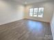 Bright office features hardwood floors and a large window at 496 19Th Avenue Nw Cir, Hickory, NC 28601