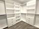 Spacious walk-in closet with ample shelving and drawers at 496 19Th Avenue Nw Cir, Hickory, NC 28601