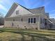 Brick home with gray siding, multiple windows, and a grassy yard at 496 19Th Avenue Nw Cir, Hickory, NC 28601