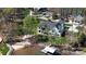 Backyard with dock, trees, and lakeside access at 5056 Bridge Way, Denver, NC 28037