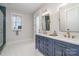 Modern bathroom with double vanity and walk-in shower at 5056 Bridge Way, Denver, NC 28037