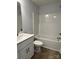 Clean bathroom featuring a tub/shower combo, single sink vanity, and neutral color palette at 702 Park Ave, Salisbury, NC 28144