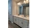 Spacious bathroom with a double sink vanity and large mirror at 702 Park Ave, Salisbury, NC 28144
