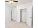 Bright bedroom with carpet flooring and a double-door closet at 1535 Solitude Ct, Kannapolis, NC 28081