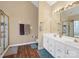 Bathroom with double sinks, shower, and separate tub at 17628 Cambridge Grove Dr, Huntersville, NC 28078