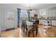 Kitchen dining area with table and chairs, and access to backyard at 17628 Cambridge Grove Dr, Huntersville, NC 28078