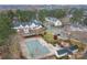 Aerial view of community pool and surrounding townhomes at 2022 University Heights Ln, Charlotte, NC 28213