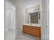 Bathroom with vanity, mirror and access to shower at 2022 University Heights Ln, Charlotte, NC 28213