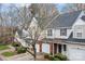 Townhouse exterior with two-car garage at 2022 University Heights Ln, Charlotte, NC 28213