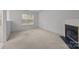 Spacious living room featuring a fireplace at 2022 University Heights Ln, Charlotte, NC 28213