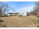 View of backyard with house and trees at 25 Kesler St, Salisbury, NC 28144