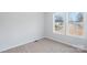 Simple bedroom with neutral walls and carpet at 25 Kesler St, Salisbury, NC 28144