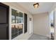 Charming front porch with light-colored siding and black shutters at 25 Kesler St, Salisbury, NC 28144