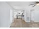 Open concept living area with light gray walls and laminate flooring at 25 Kesler St, Salisbury, NC 28144