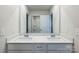 Double vanity bathroom with a large mirror and updated fixtures at 3064 Virginia Trail Ct, Fort Mill, SC 29715