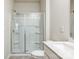 Shower stall with glass enclosure and built-in shelving at 3064 Virginia Trail Ct, Fort Mill, SC 29715