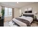 Primary bedroom with a plush bed and city view at 3064 Virginia Trail Ct, Fort Mill, SC 29715