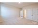 Simple bedroom with double door closet and carpet flooring at 3064 Virginia Trail Ct, Fort Mill, SC 29715