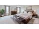 Main bedroom with a king-size bed and wood dresser at 3064 Virginia Trail Ct, Fort Mill, SC 29715