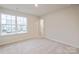 Simple bedroom with carpet and large window at 3064 Virginia Trail Ct, Fort Mill, SC 29715