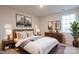 Cozy bedroom with wooden bed frame and neutral decor at 3064 Virginia Trail Ct, Fort Mill, SC 29715