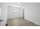 Bedroom with light wood floors and a window at 3433 Spinner Ct, Sherrills Ford, NC 28673