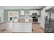 Bright kitchen with stainless steel appliances and a wooden breakfast island at 3433 Spinner Ct, Sherrills Ford, NC 28673