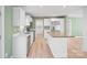 Modern kitchen featuring stainless steel appliances, island, and white cabinetry at 3433 Spinner Ct, Sherrills Ford, NC 28673