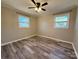 Well-lit bedroom featuring hardwood floors and ceiling fan at 3654 Lynwood Dr, Lancaster, SC 29720