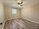 Bright bedroom with hardwood floors and ceiling fan at 3654 Lynwood Dr, Lancaster, SC 29720