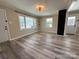 Spacious living room showcasing neutral decor and wood-look flooring at 3654 Lynwood Dr, Lancaster, SC 29720