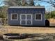 Large storage shed in backyard with double doors at 3654 Lynwood Dr, Lancaster, SC 29720