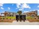 View of community mailboxes surrounded by townhomes and manicured landscaping at 5544 Stafford Rd # 30, Charlotte, NC 28215