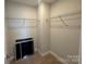 Spacious walk-in closet with wire shelving and neutral paint, ready for organizing at 5544 Stafford Rd # 30, Charlotte, NC 28215