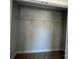 A standard closet with a single shelf for clothing or storage at 5548 Stafford Rd # 29, Charlotte, NC 28215